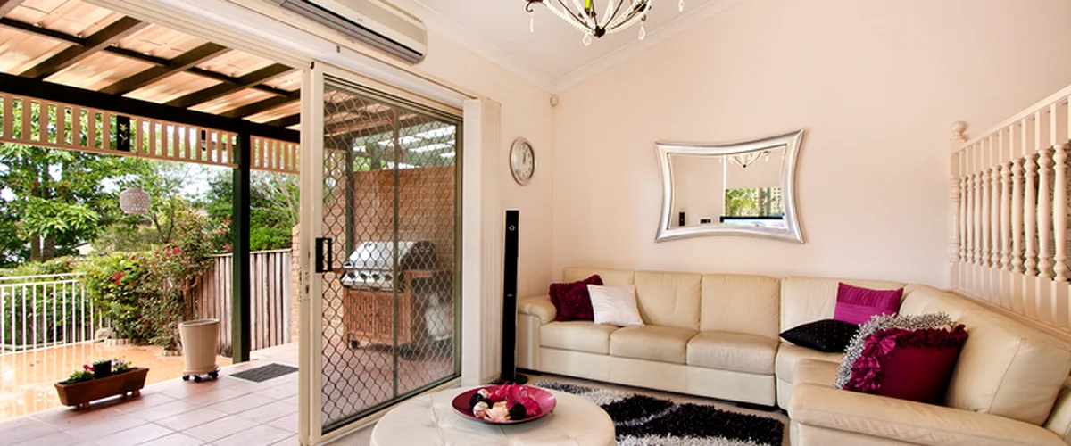 adu construction pico rivera ca home additions luxurious living room with cream sectional sofa modern chandelier and sliding glass door